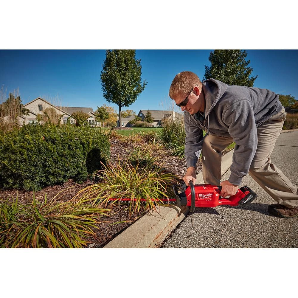 Milwaukee M18 FUEL 18V Lithium-Ion Brushless Cordless Hedge Trimmer with M18 6-Port Sequential Battery Charger 14 Milwaukee M18 FUEL 18V Lithium-Ion Brushless Cordless Hedge Trimmer with M18 6-Port Sequential Battery Charger - Image 12